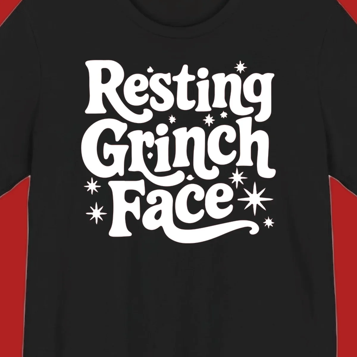 Resting Grinch Face text with stars, holiday design.