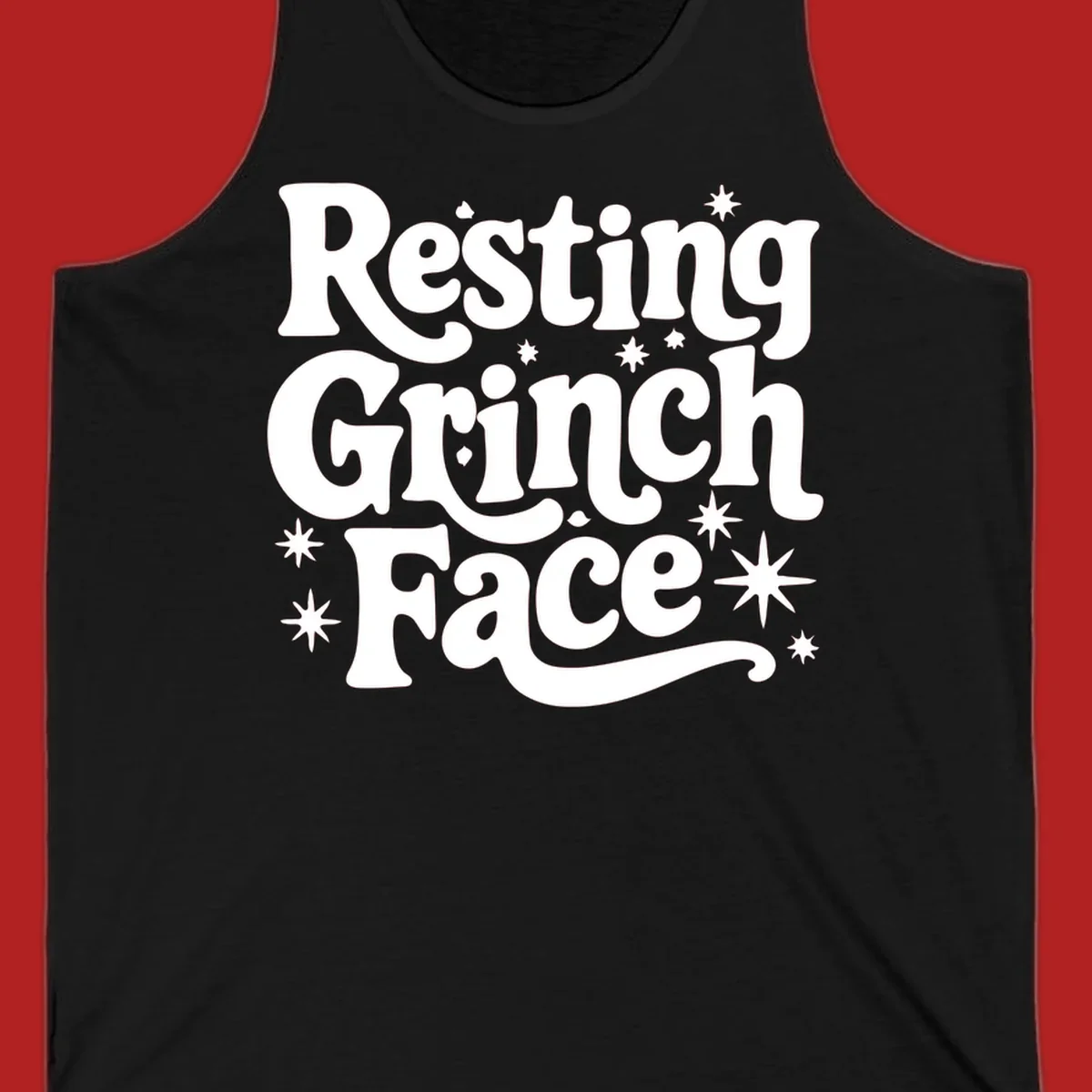 Resting Grinch Face text with stars, holiday design.