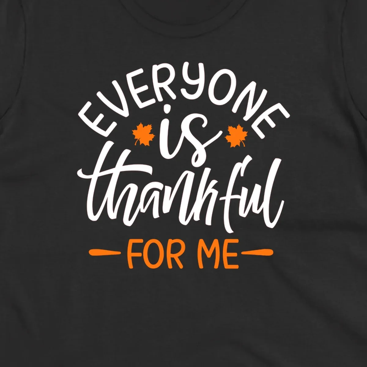 Typography design with text "EVERYONE is thankful FOR ME" and maple leaves, for Thanksgiving.