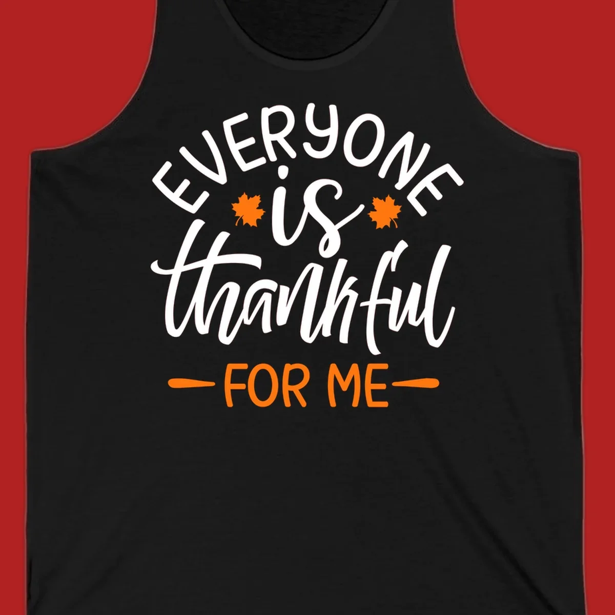 Typography design with text "EVERYONE is thankful FOR ME" and maple leaves, for Thanksgiving.