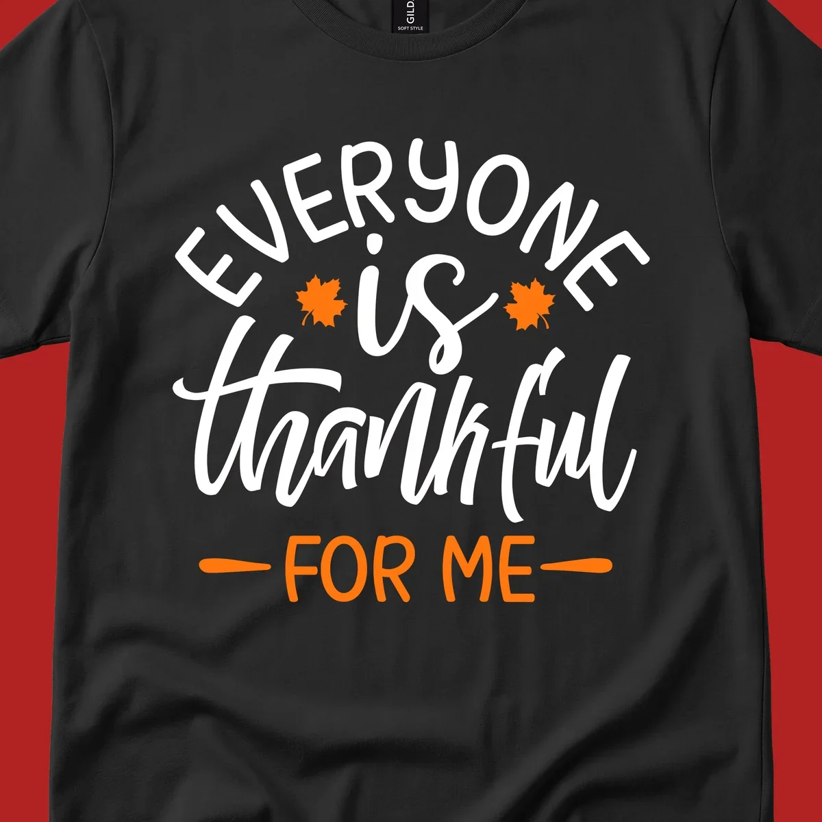 Typography design with text "EVERYONE is thankful FOR ME" and maple leaves, for Thanksgiving.