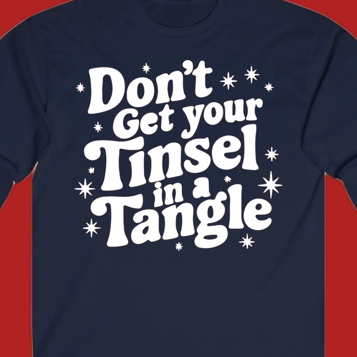 Don't get your tinsel in a tangle holiday text with stars, retro font.