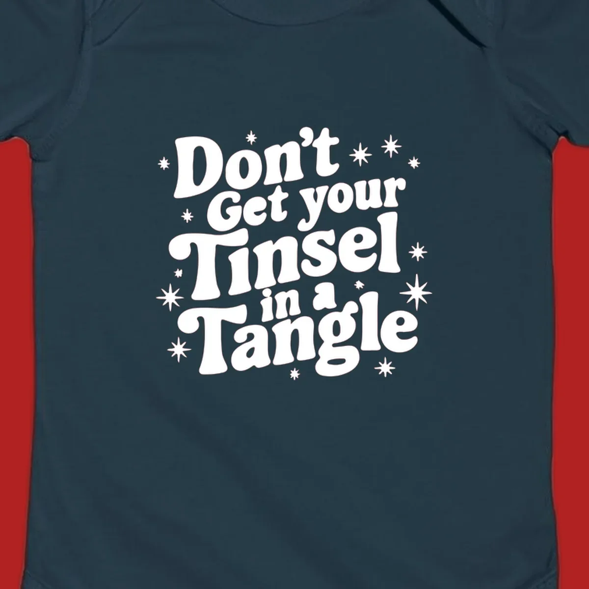 Don't get your tinsel in a tangle holiday text with stars, retro font.