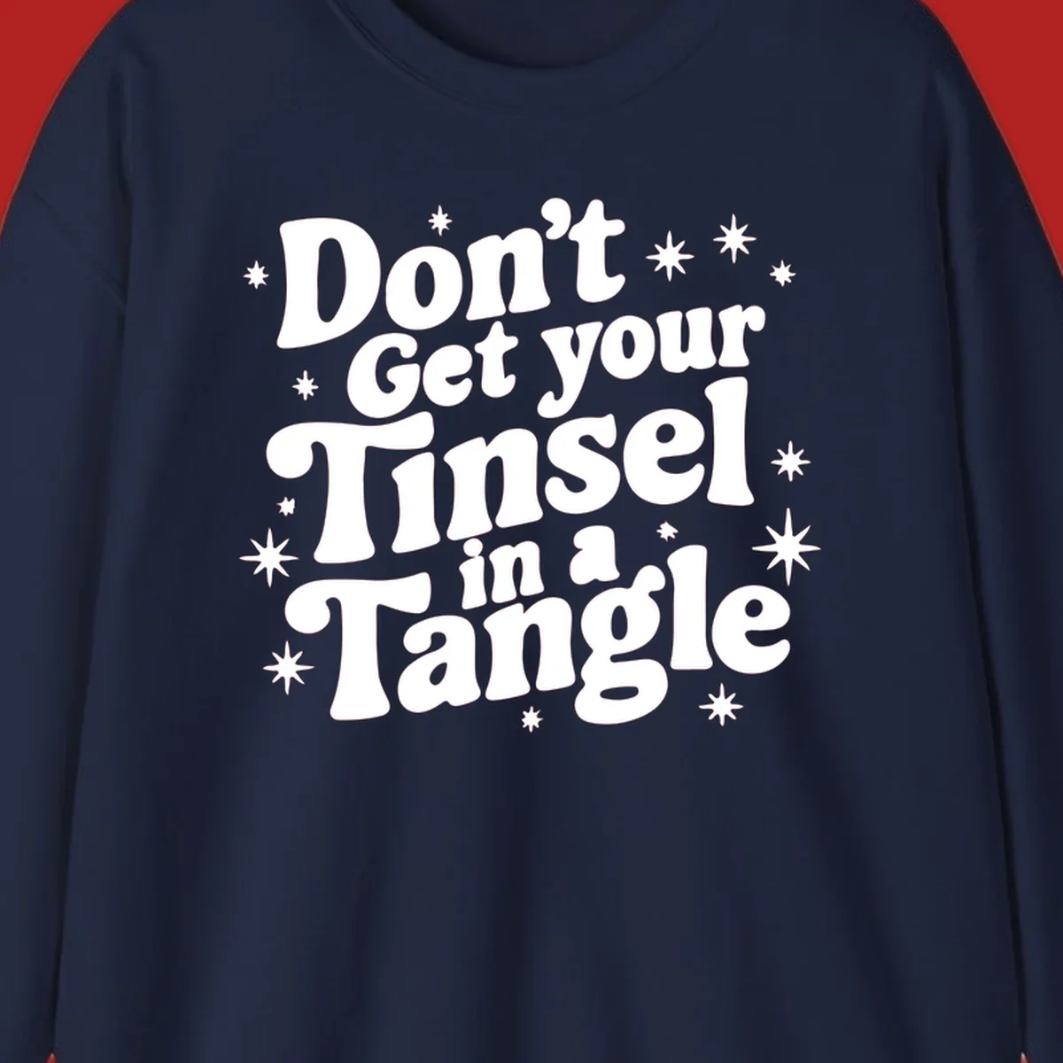 Don't get your tinsel in a tangle holiday text with stars, retro font.