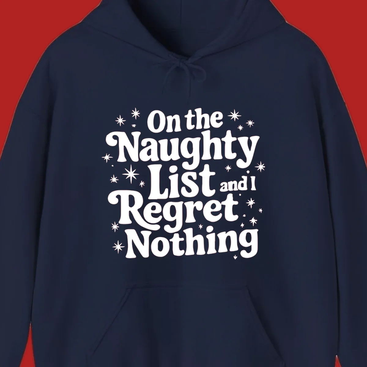 On the Naughty List And I Regret Nothing white text with stars graphic.