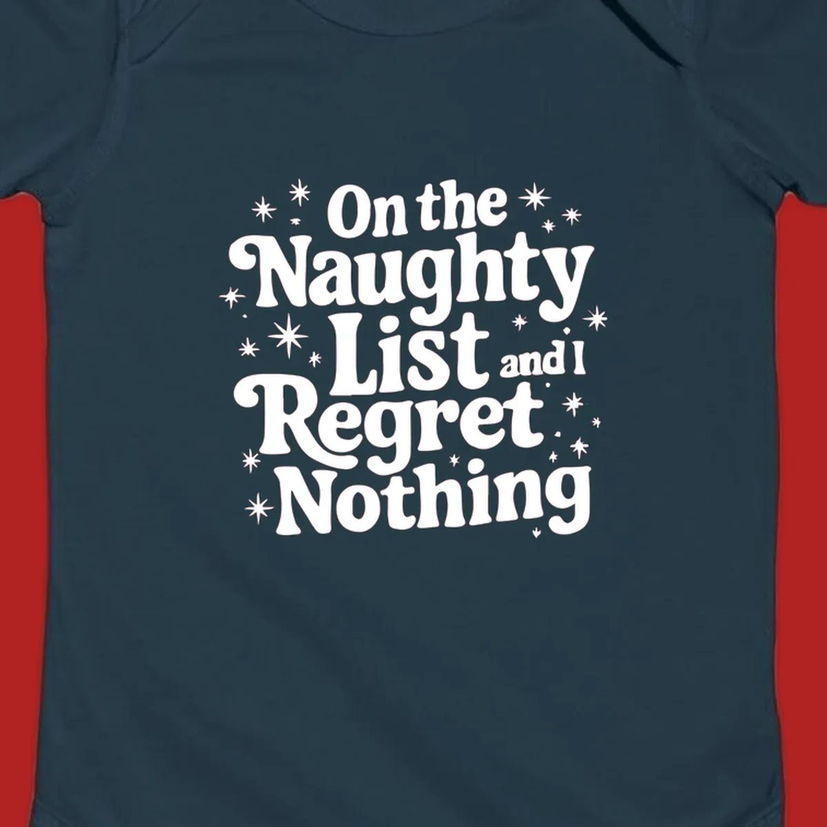 On the Naughty List And I Regret Nothing white text with stars graphic.