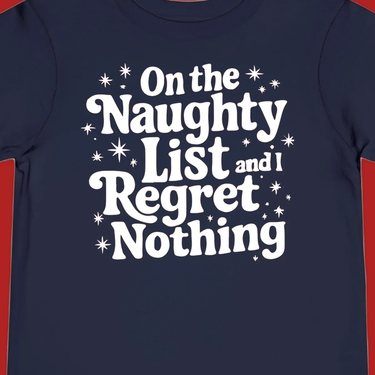 On the Naughty List And I Regret Nothing white text with stars graphic.