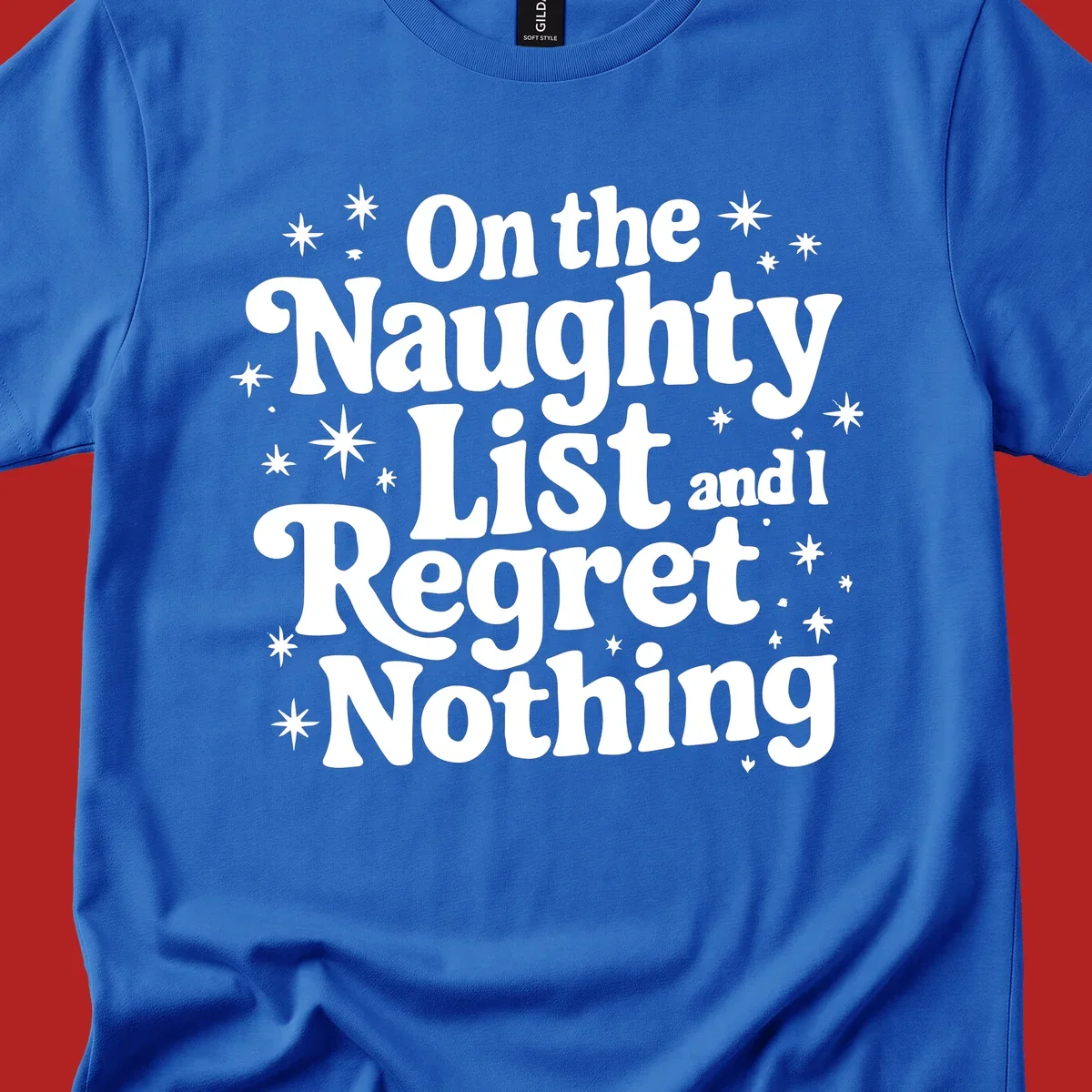 On the Naughty List And I Regret Nothing white text with stars graphic.