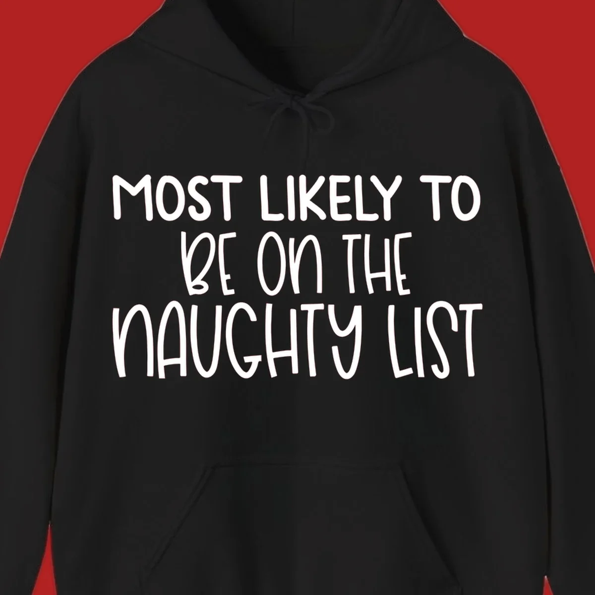 White text on black background reading 'MOST LIKELY TO BE ON THE NAUGHTY LIST', for the naughty list Christmas concept.