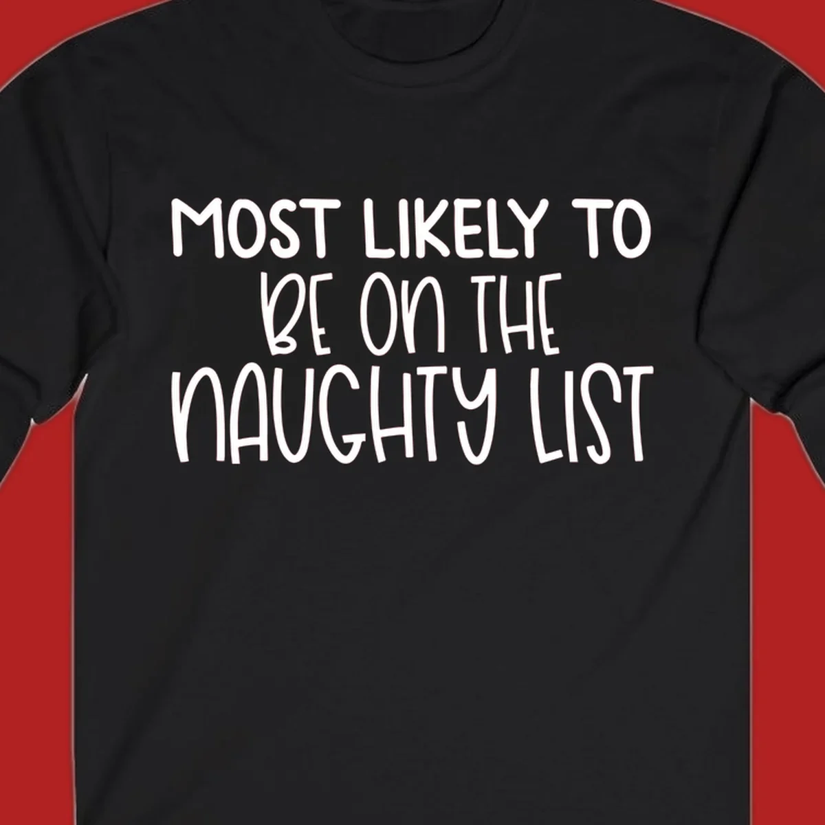 White text on black background reading 'MOST LIKELY TO BE ON THE NAUGHTY LIST', for the naughty list Christmas concept.