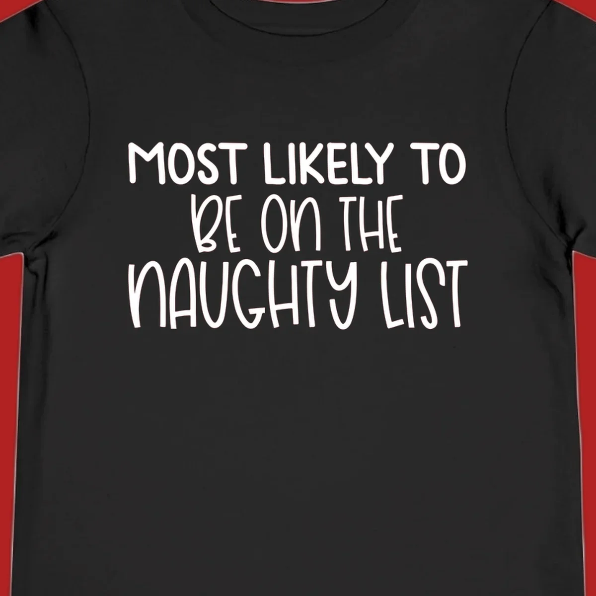 White text on black background reading 'MOST LIKELY TO BE ON THE NAUGHTY LIST', for the naughty list Christmas concept.