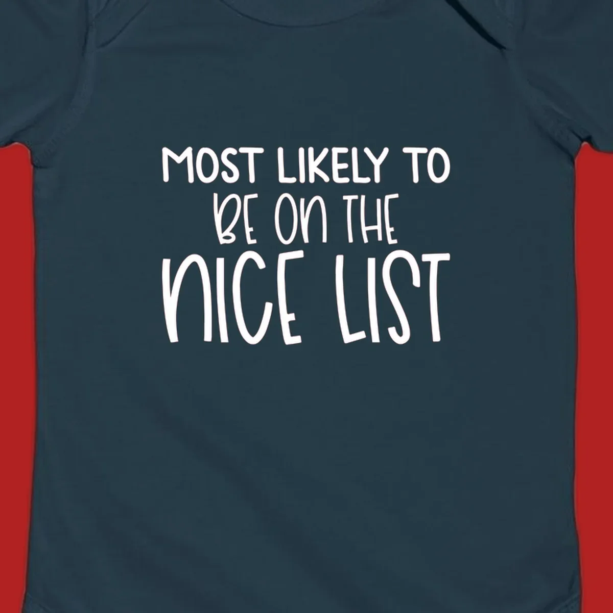 Text design 'Most Likely To Be On The Nice List' in white, celebrating Christmas.
