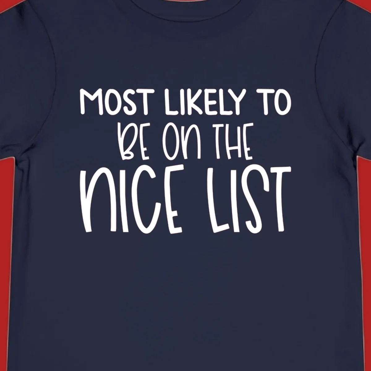 Text design 'Most Likely To Be On The Nice List' in white, celebrating Christmas.