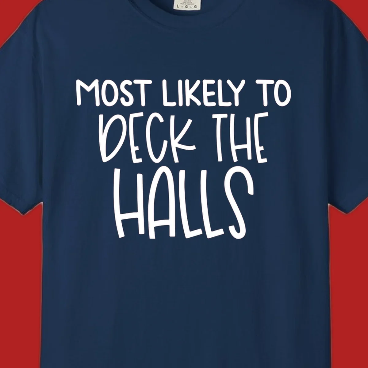 Text design 'Most Likely To Deck The Halls' in white lettering.