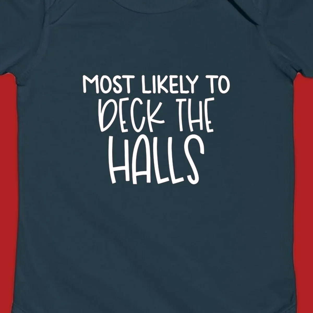 Text design 'Most Likely To Deck The Halls' in white lettering.