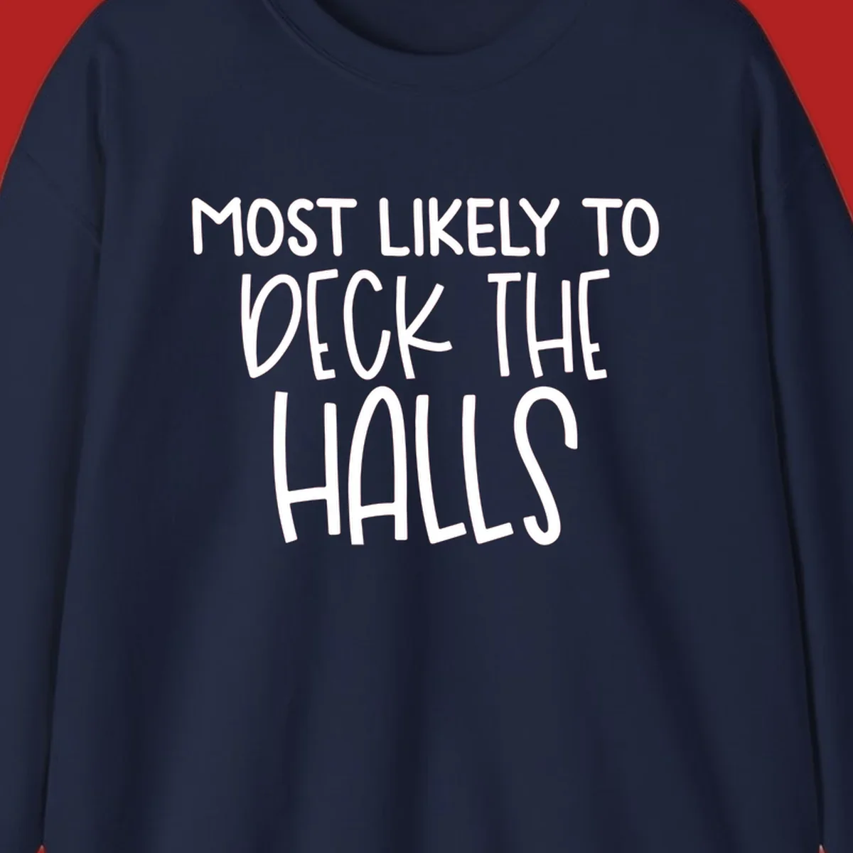 Text design 'Most Likely To Deck The Halls' in white lettering.