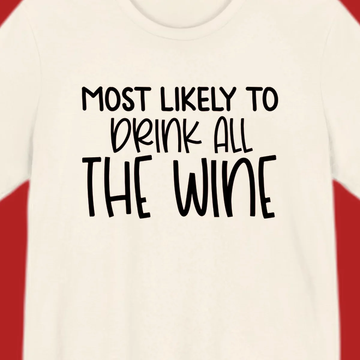 Text design 'MOST LIKELY TO DRINK ALL THE WINE' in white lettering.