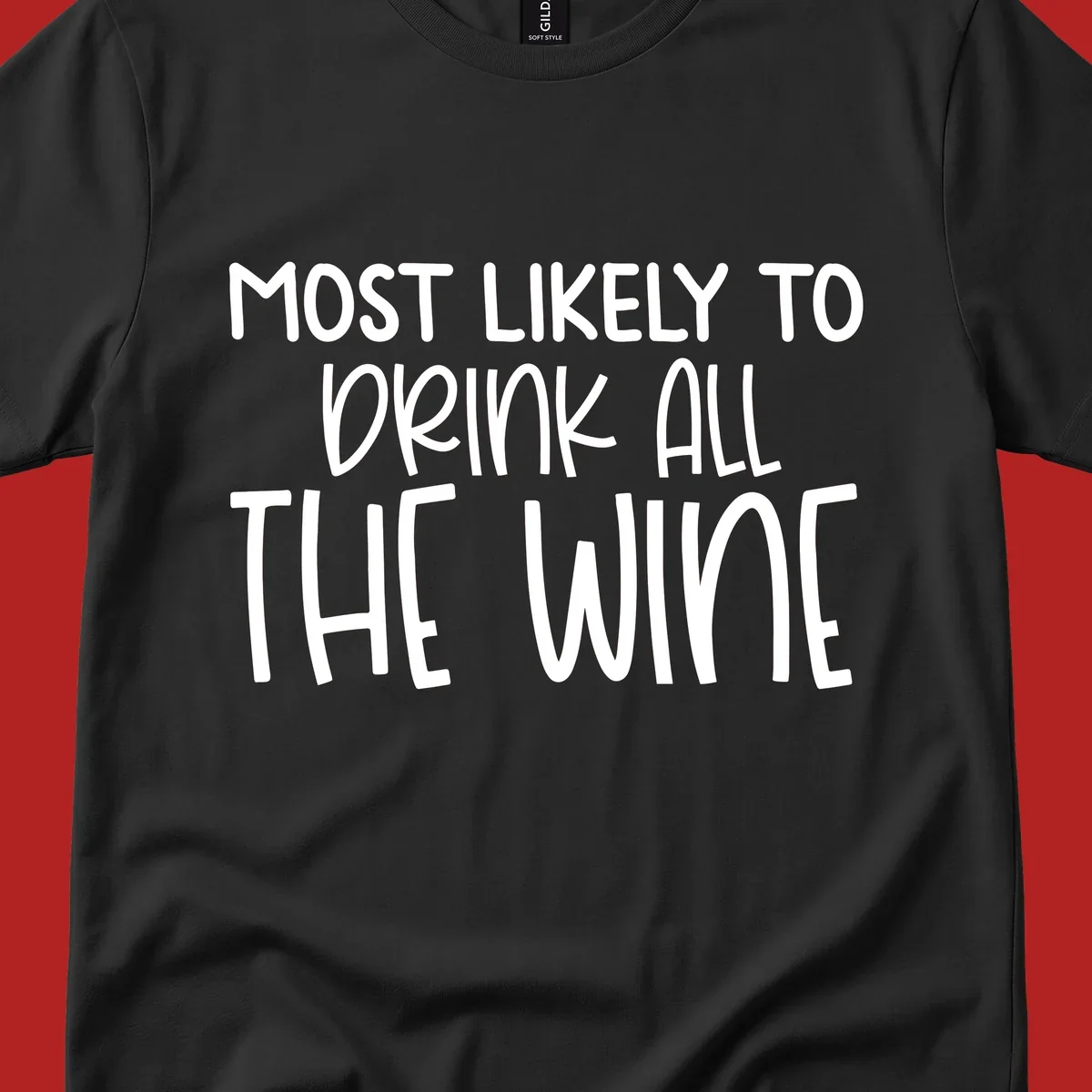 Text design 'MOST LIKELY TO DRINK ALL THE WINE' in white lettering.