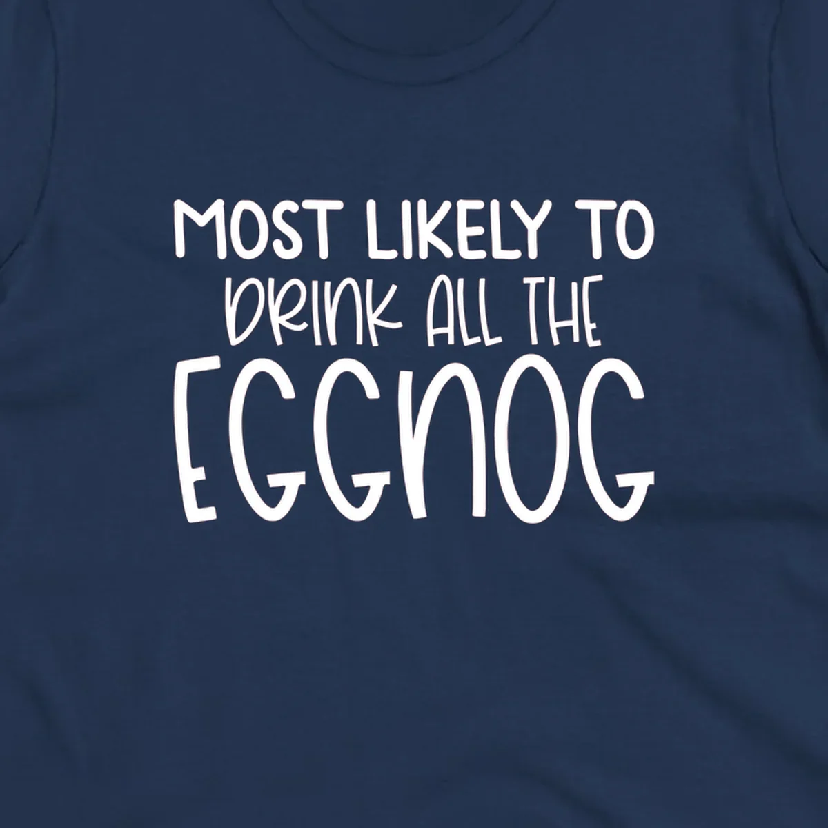 Text design 'Most Likely To Drink All The Eggnog' in white festive lettering for Christmas.