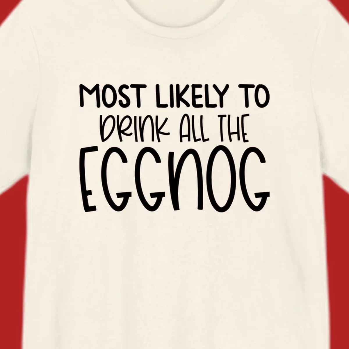 Text design 'Most Likely To Drink All The Eggnog' in white festive lettering for Christmas.