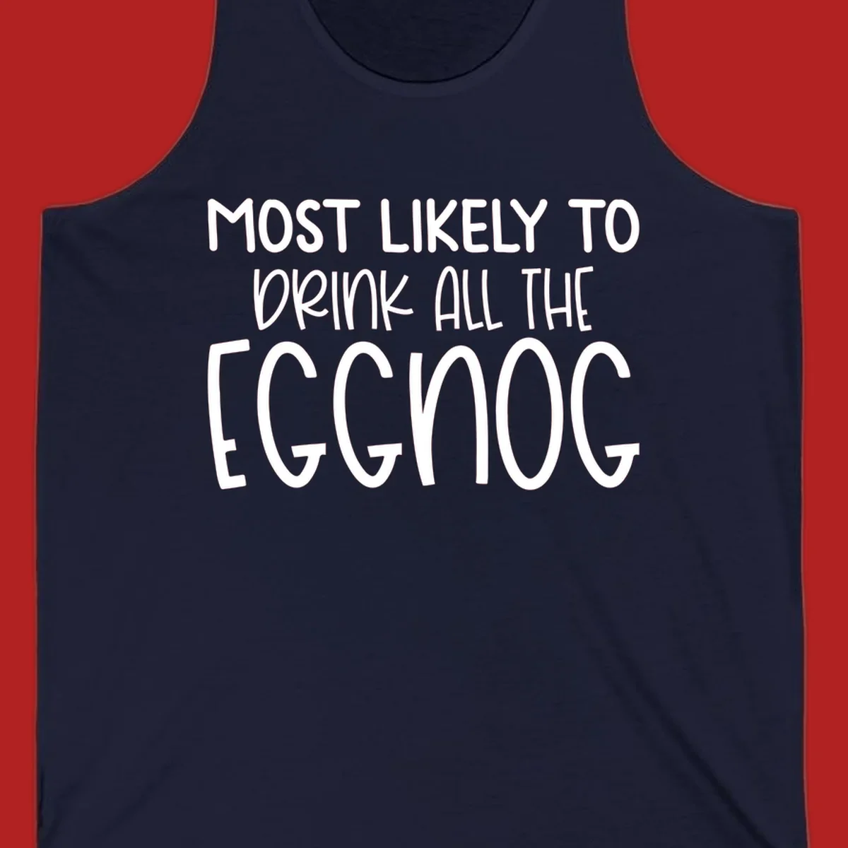 Text design 'Most Likely To Drink All The Eggnog' in white festive lettering for Christmas.
