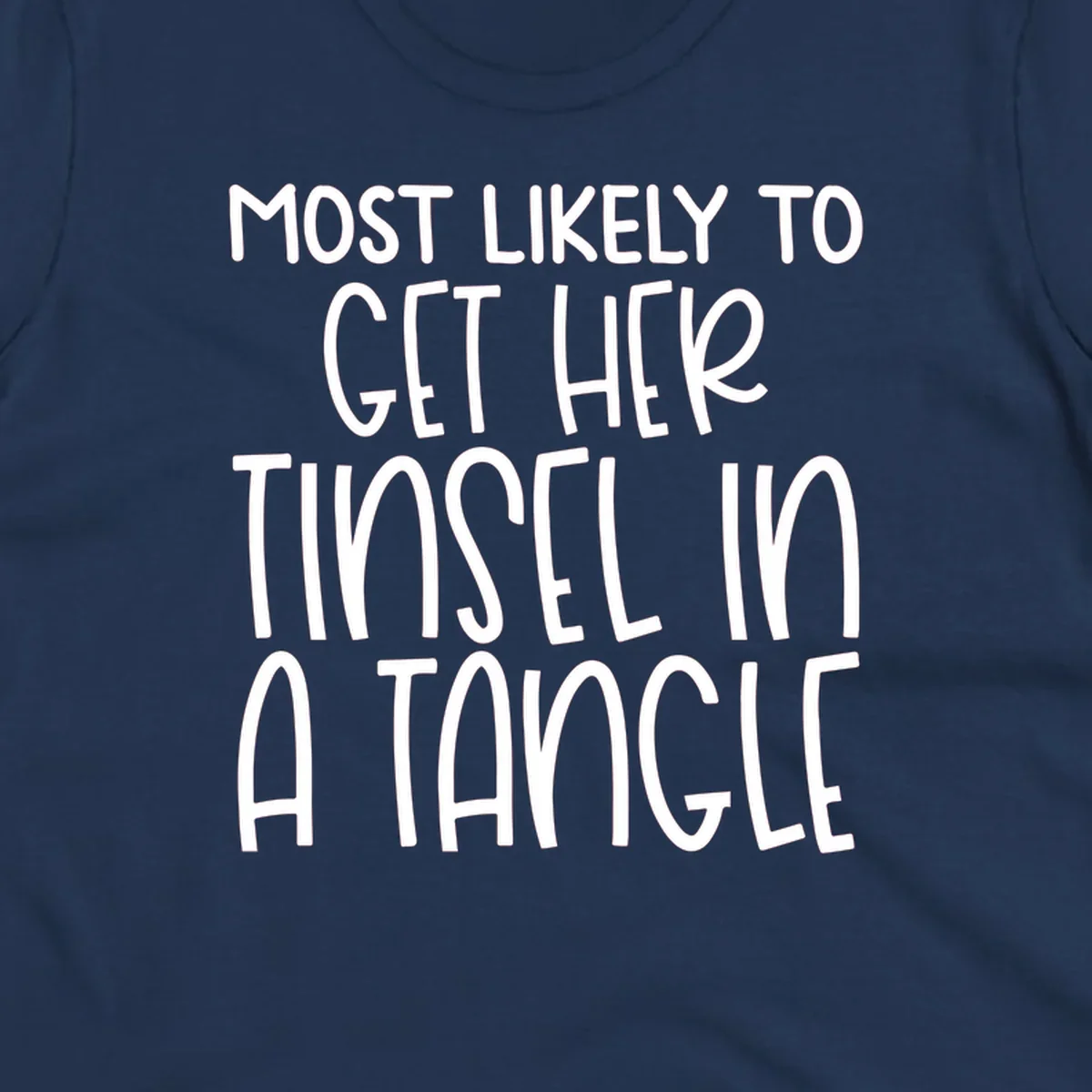 White text 'Most Likely To Get Her Tinsel In A Tangle' on a black background, holiday phrase.
