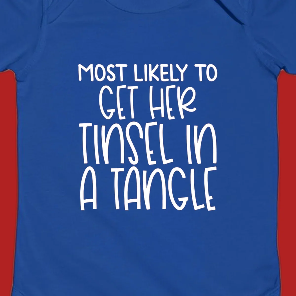 White text 'Most Likely To Get Her Tinsel In A Tangle' on a black background, holiday phrase.