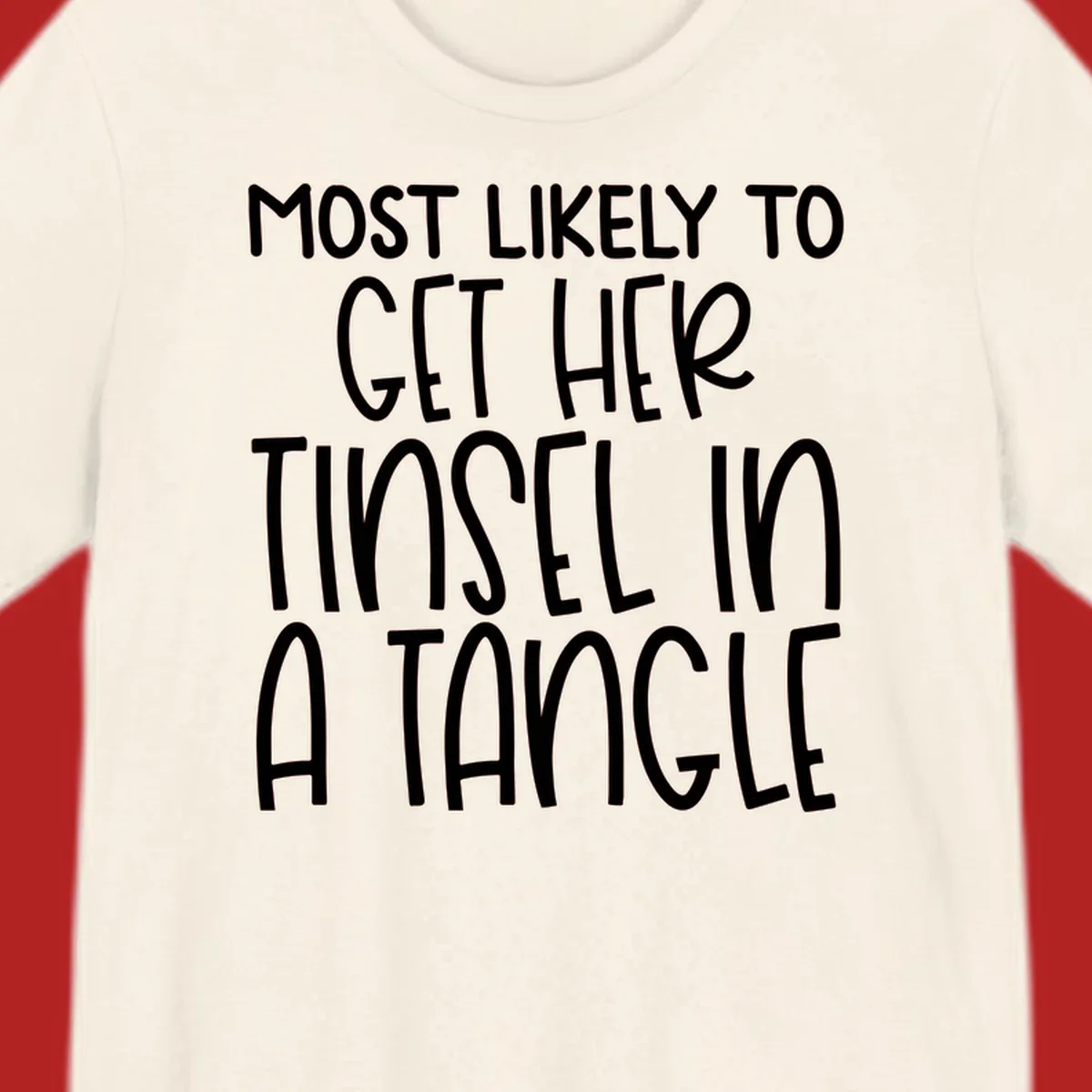 White text 'Most Likely To Get Her Tinsel In A Tangle' on a black background, holiday phrase.