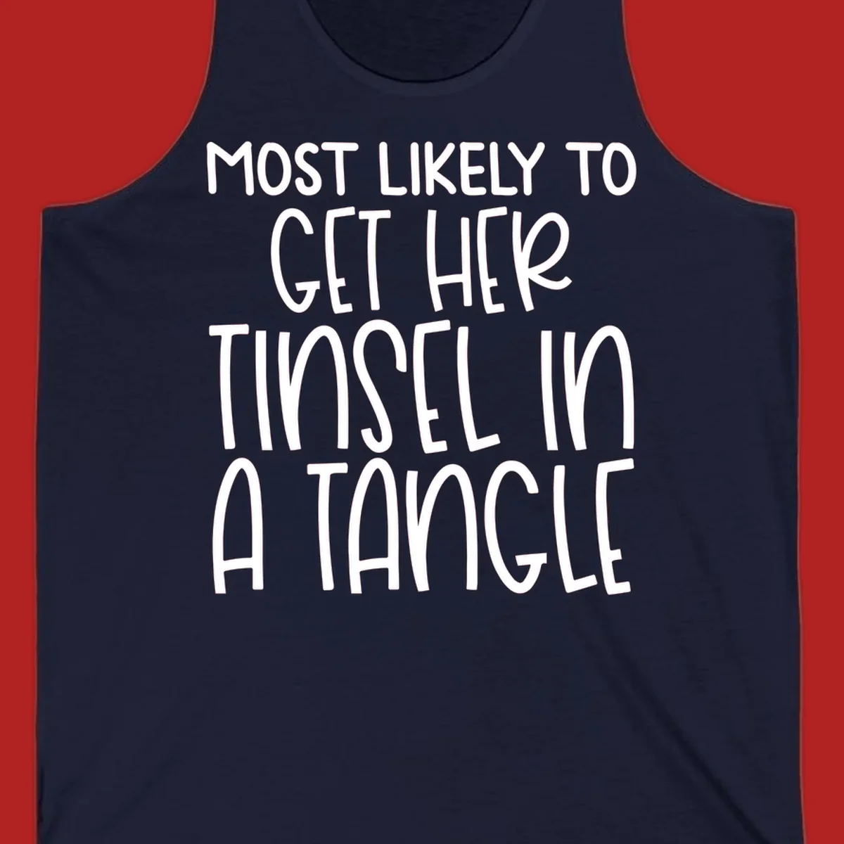 White text 'Most Likely To Get Her Tinsel In A Tangle' on a black background, holiday phrase.