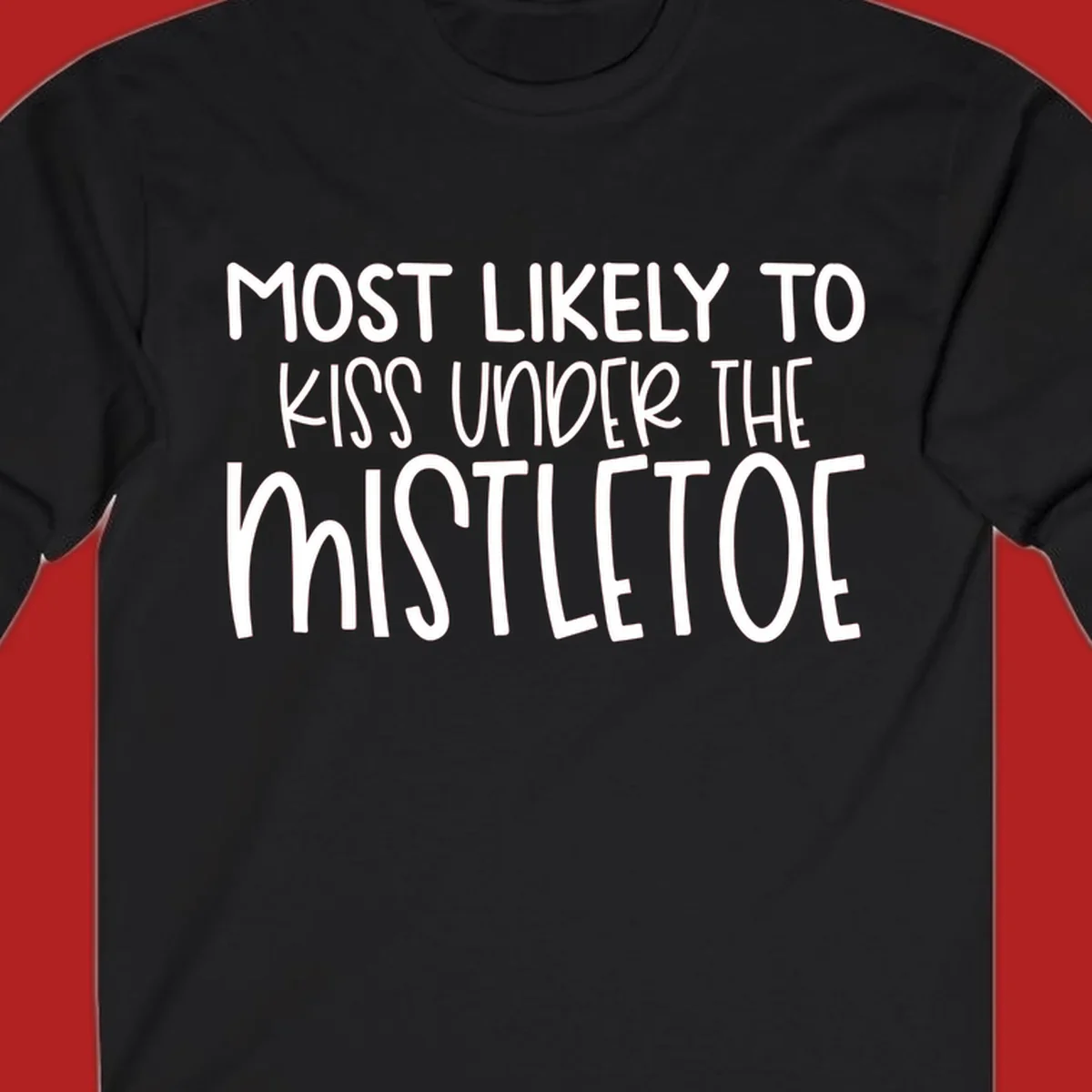 Typography design with the phrase 'Most Likely To Kiss Under Mistletoe' in white.