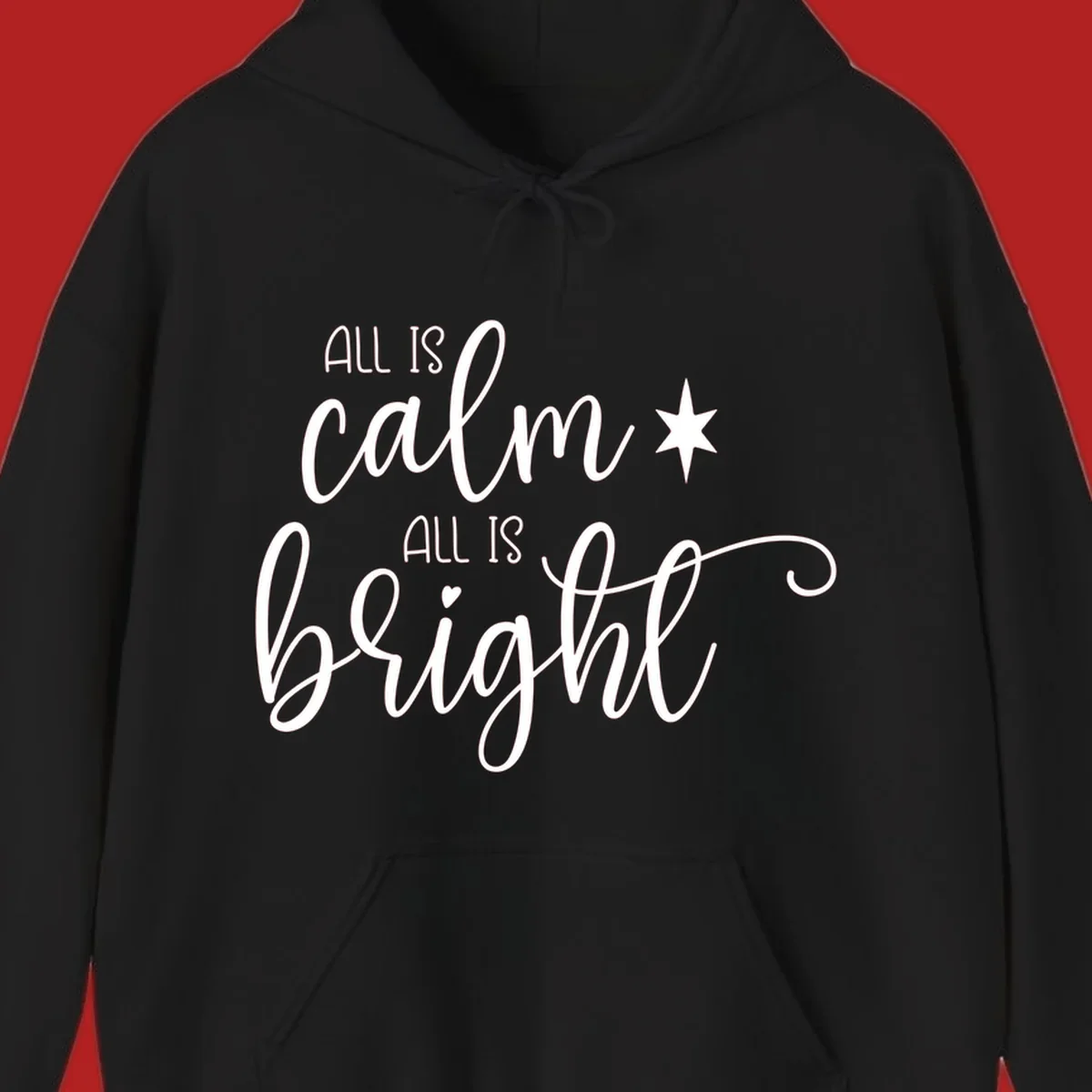 Elegant white script text 'All Is Calm All Is Bright' with star and heart, holiday design.