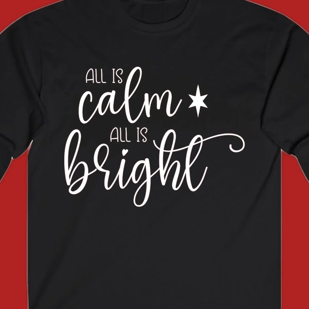 Elegant white script text 'All Is Calm All Is Bright' with star and heart, holiday design.