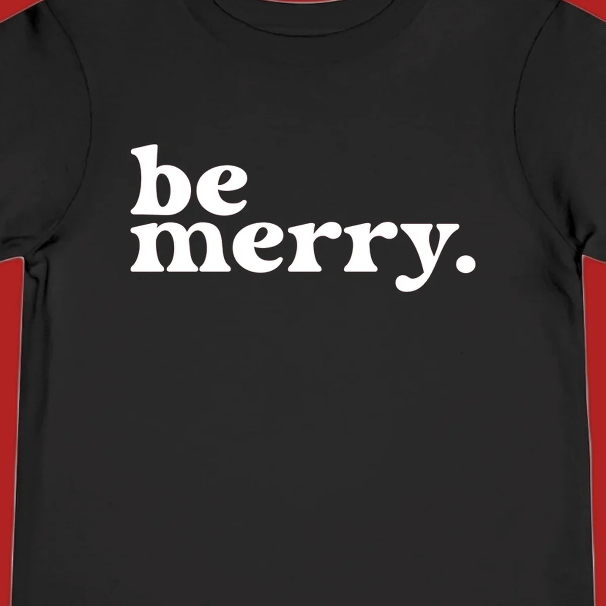 White retro typography saying 'be merry.' on a black background, perfect for the holiday season.