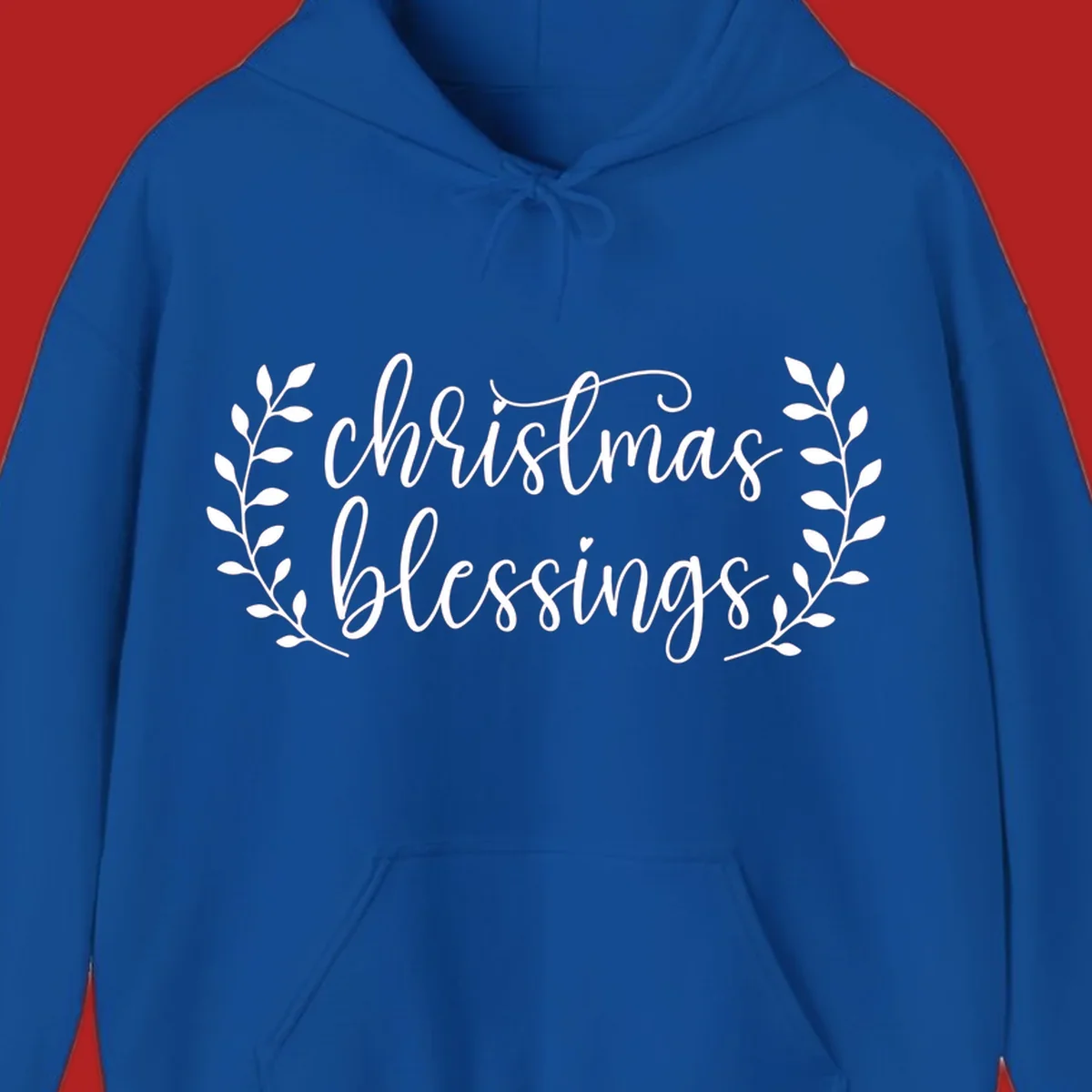 Christmas blessings text with leafy branches accent.