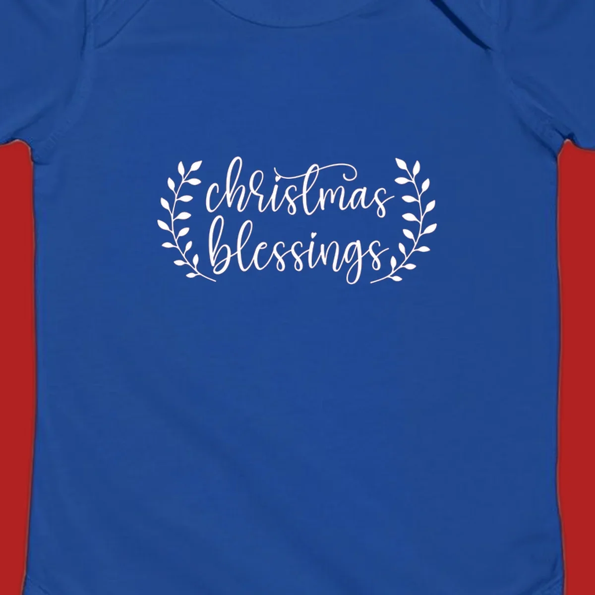Christmas blessings text with leafy branches accent.