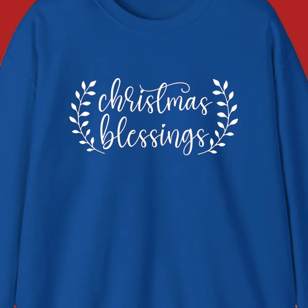Christmas blessings text with leafy branches accent.