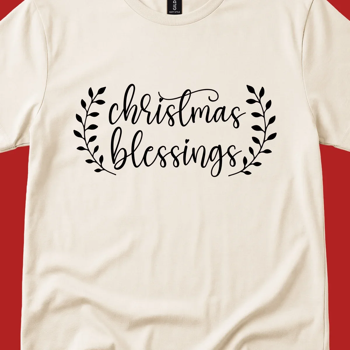 Christmas blessings text with leafy branches accent.