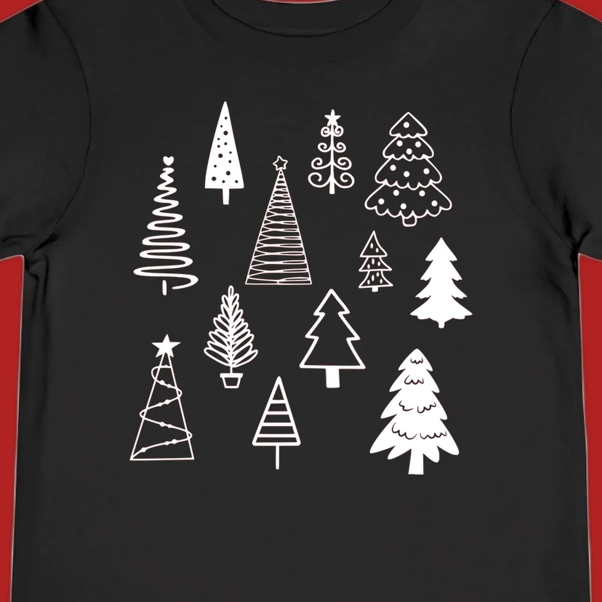 Whimsical Christmas tree collection illustration in white on black.