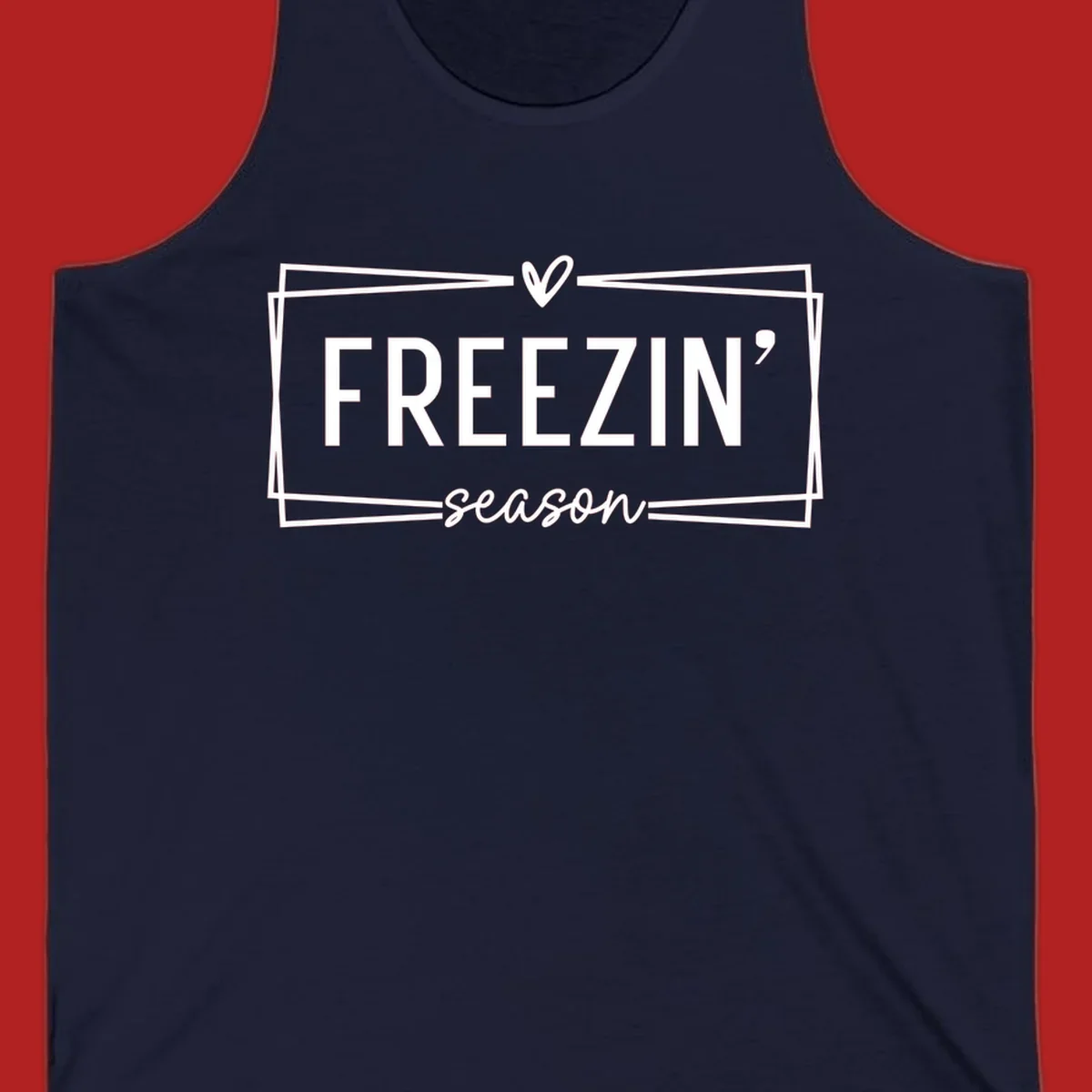Freezin' Season text design with heart icon and border, for winter holidays.
