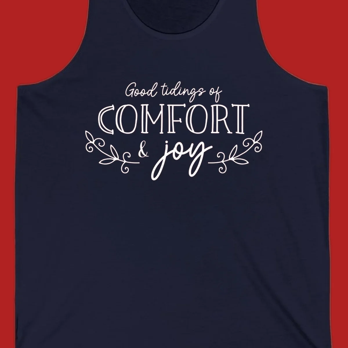 Good tidings of comfort and joy holiday text design with floral accents.
