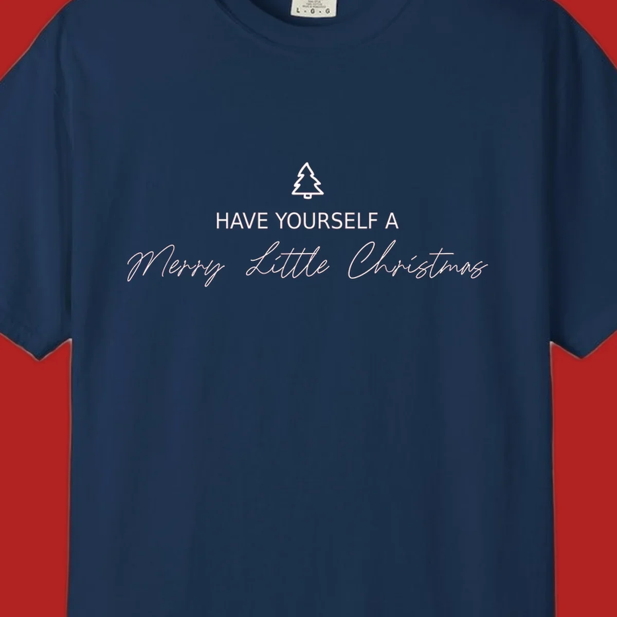 Typography design with a Christmas tree and the phrase 'Have Yourself A Merry Little Christmas' in script and block letters.