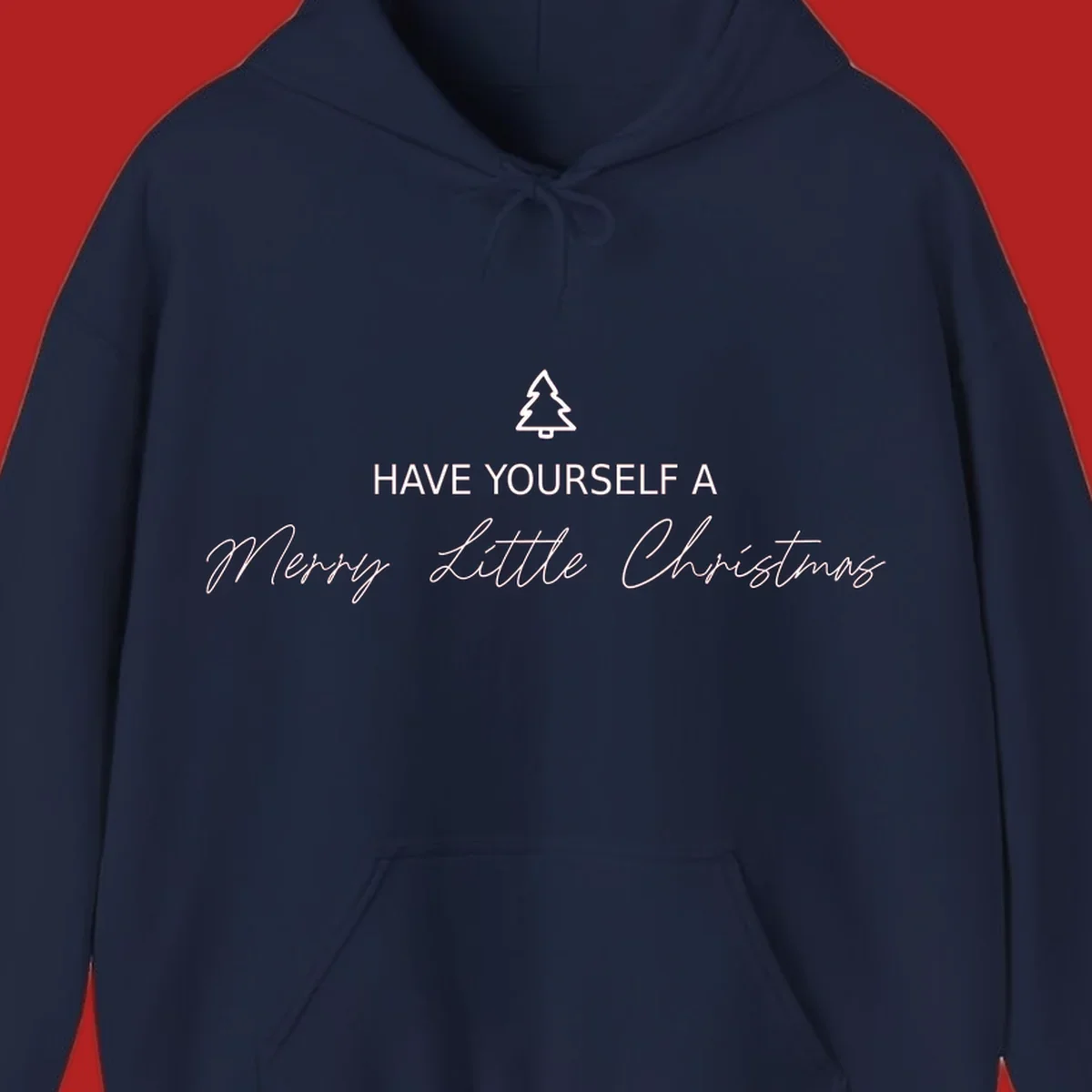 Typography design with a Christmas tree and the phrase 'Have Yourself A Merry Little Christmas' in script and block letters.