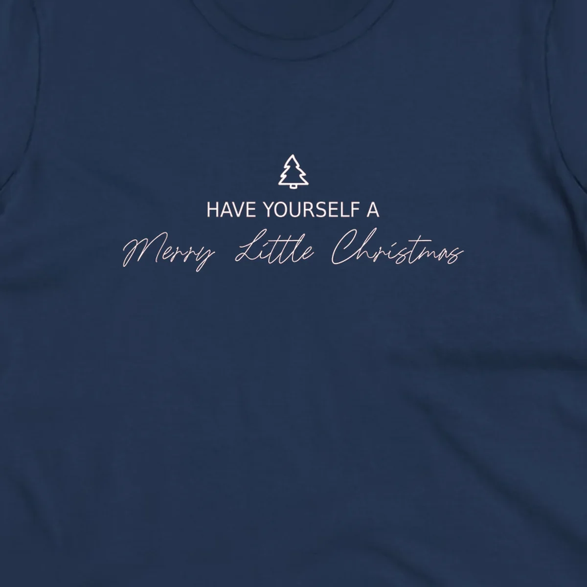 Typography design with a Christmas tree and the phrase 'Have Yourself A Merry Little Christmas' in script and block letters.