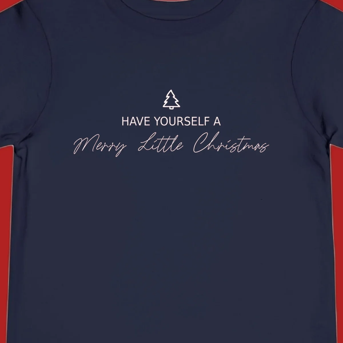 Typography design with a Christmas tree and the phrase 'Have Yourself A Merry Little Christmas' in script and block letters.