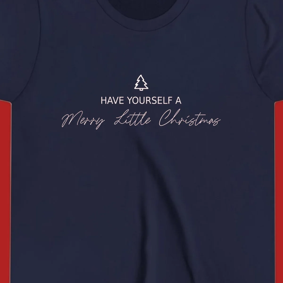 Typography design with a Christmas tree and the phrase 'Have Yourself A Merry Little Christmas' in script and block letters.