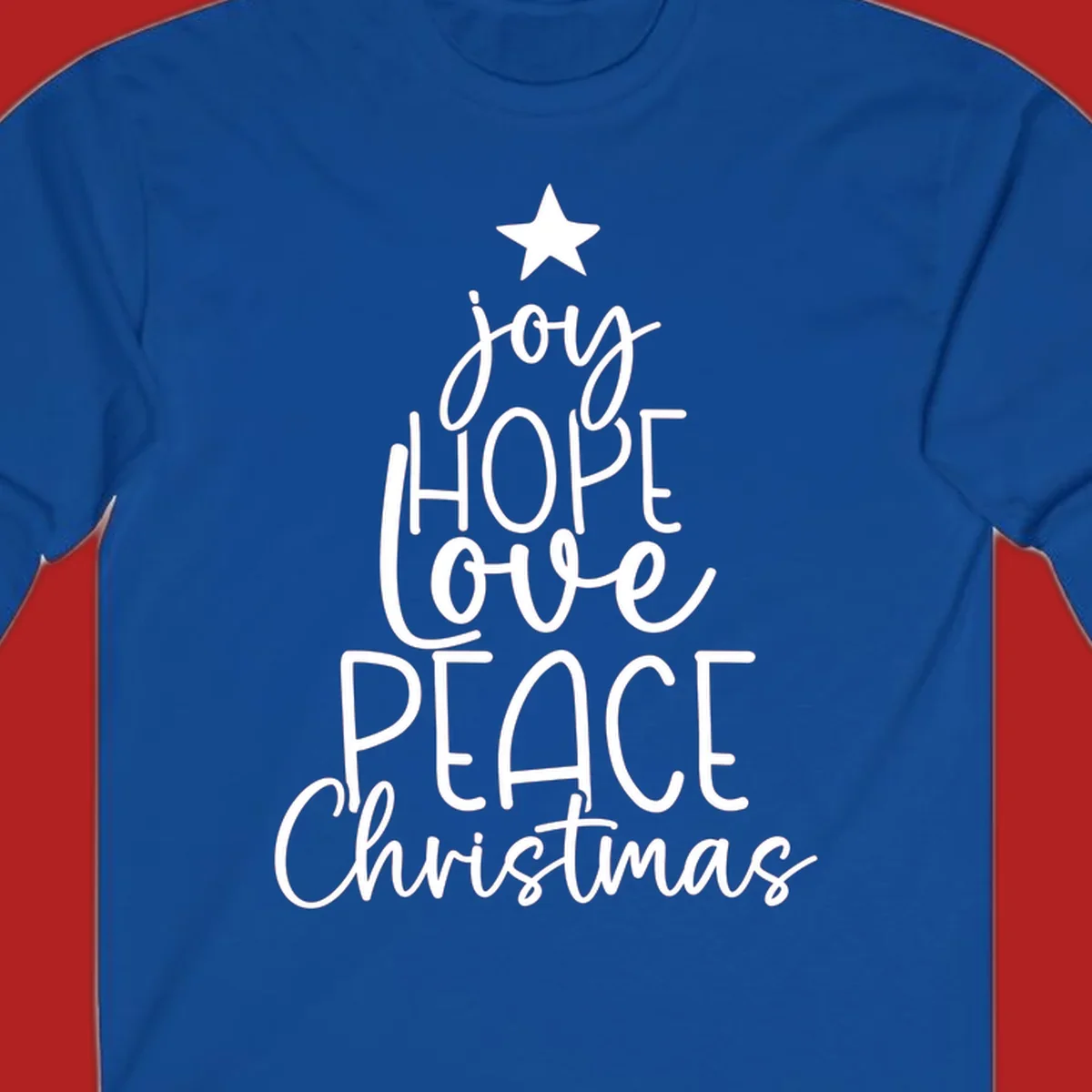 Christmas tree made of words joy, hope, love, peace, and Christmas with a star on top.