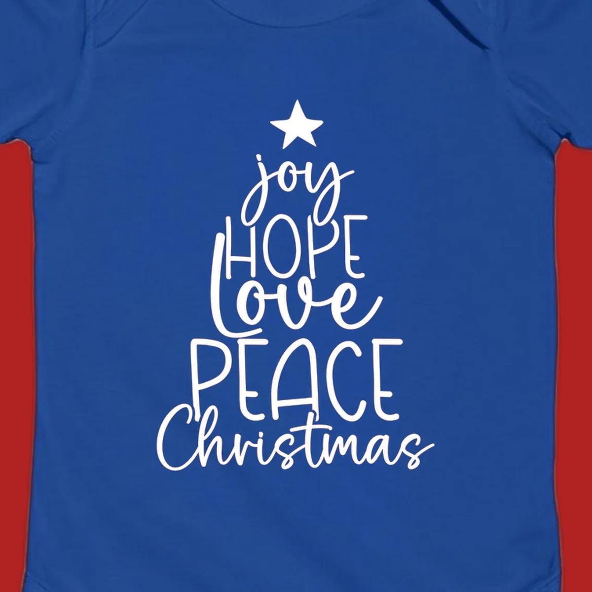 Christmas tree made of words joy, hope, love, peace, and Christmas with a star on top.