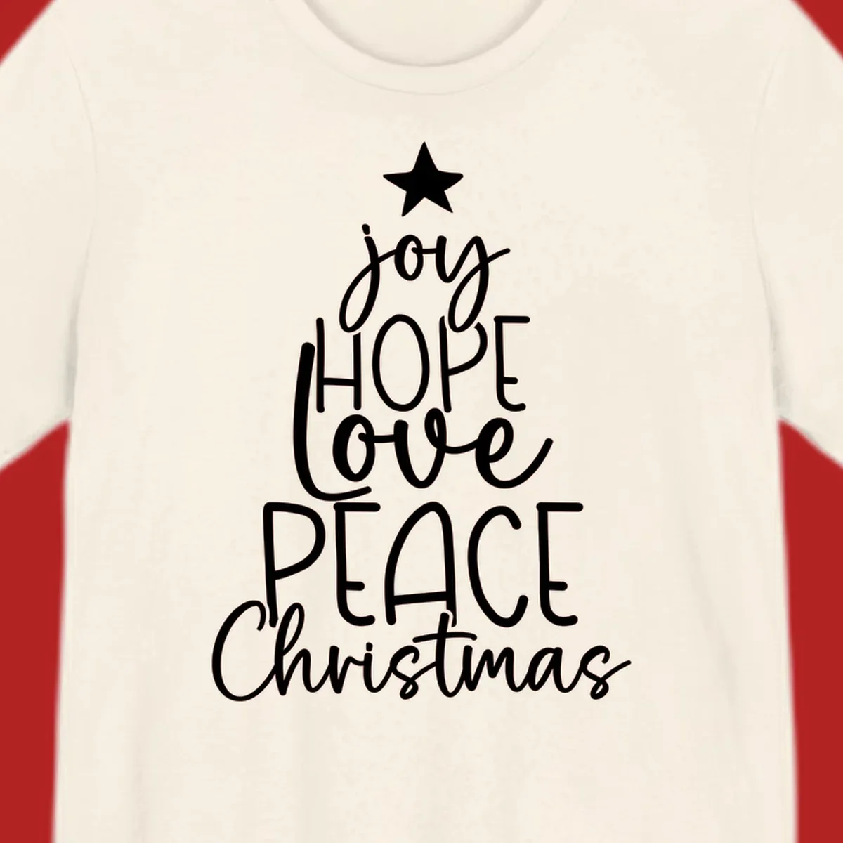 Christmas tree made of words joy, hope, love, peace, and Christmas with a star on top.