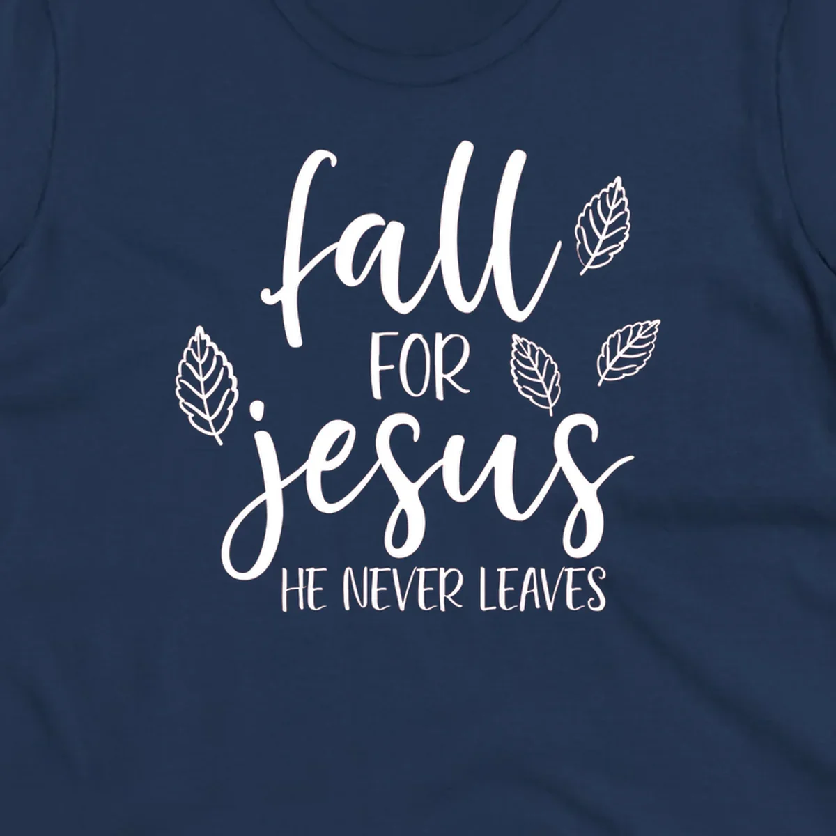 Fall for Jesus He Never Leaves text with autumn leaves design