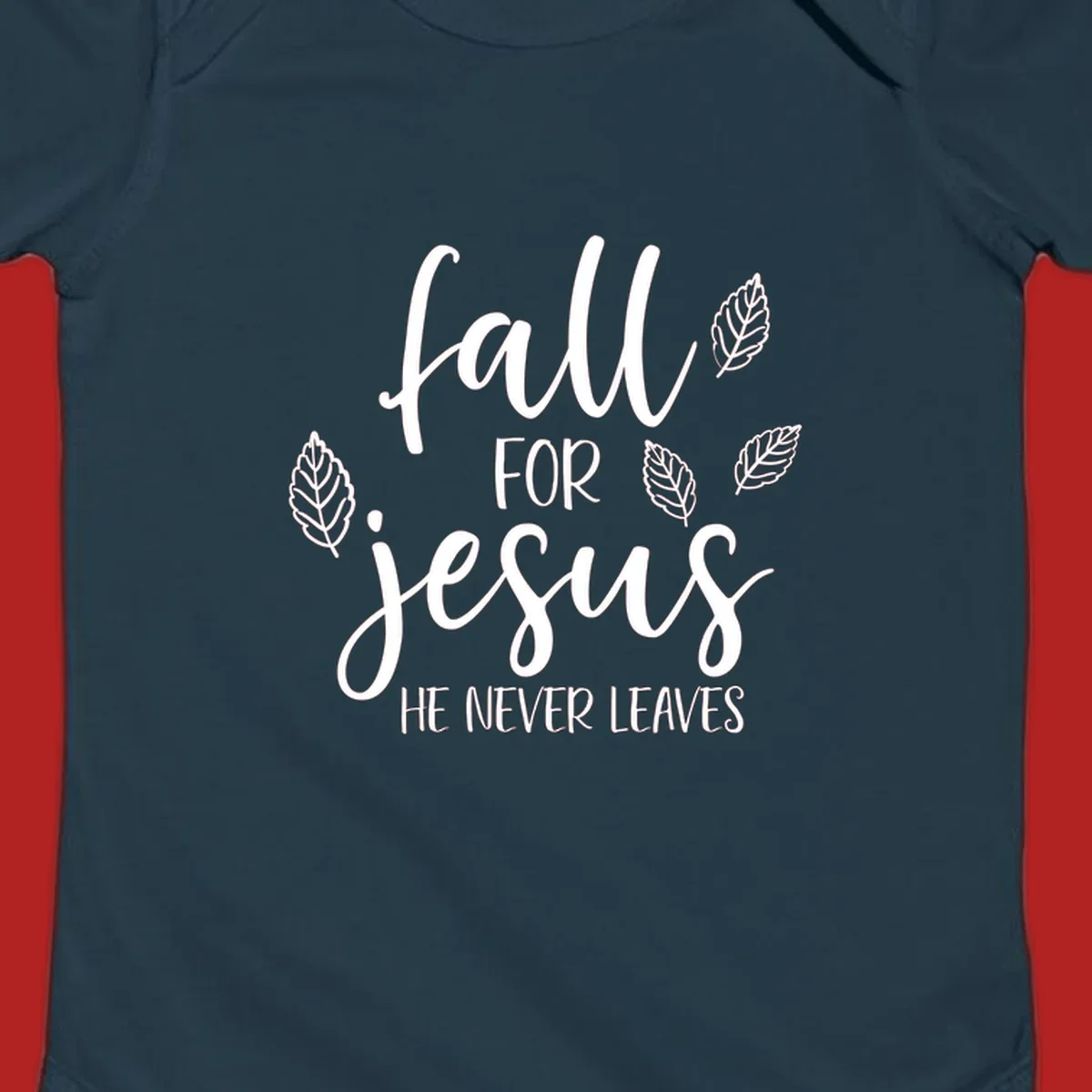 Fall for Jesus He Never Leaves text with autumn leaves design